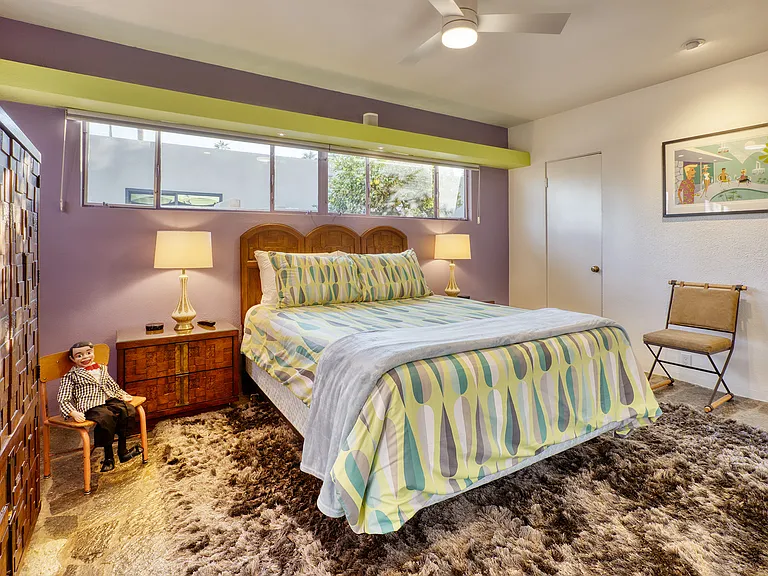 Second bedroom with designer walk in closet.