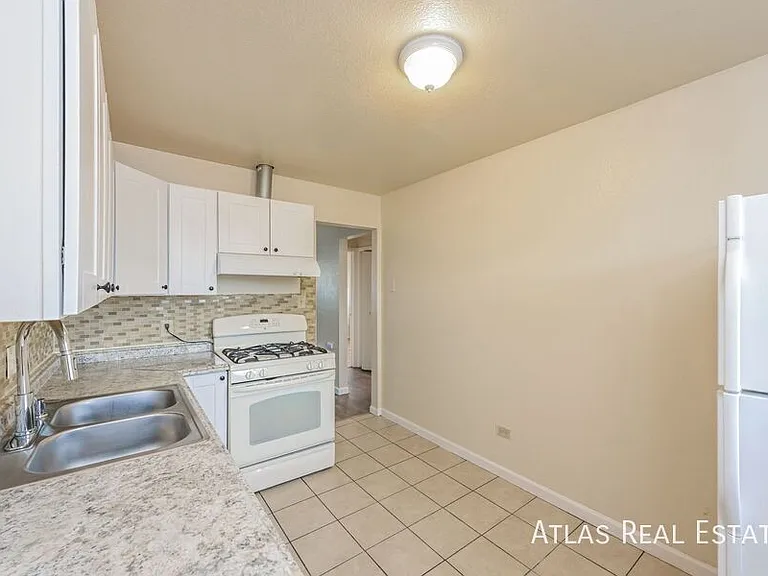 1463 W Byers Pl — Photo 2