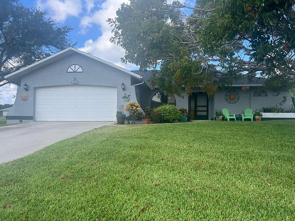 Spacious corner lot with fenced in back yard in the SW region of Cape Coral! Close to downtown, the maria's, beach, and shops and restaurants!