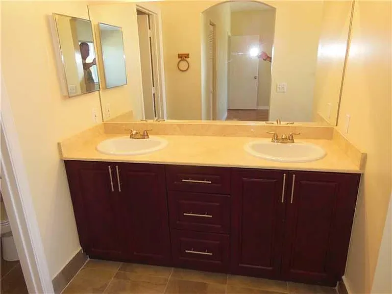 Updated master bath vanity, dble sinks w/marble vanity top.