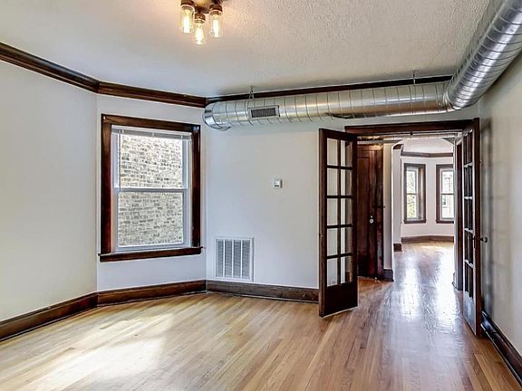 View from the dining room toward the main entrance and living room.