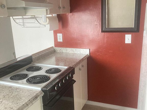 From the dining area looking into the left side of kitchen