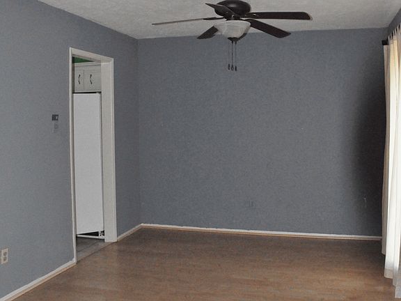 Formal dining or office, doorway to kitchen