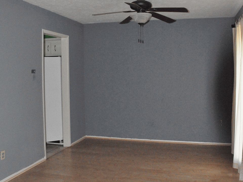 Formal dining or office, doorway to kitchen