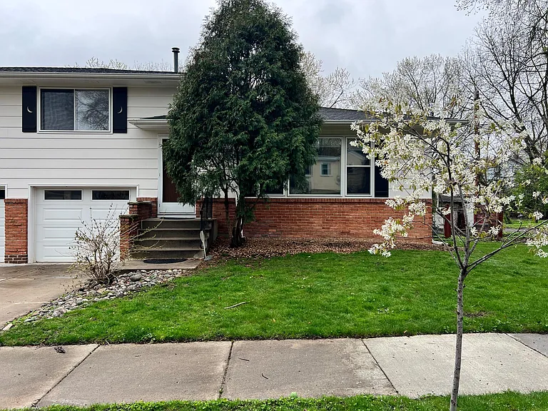 Front of duplex. Side yard as well