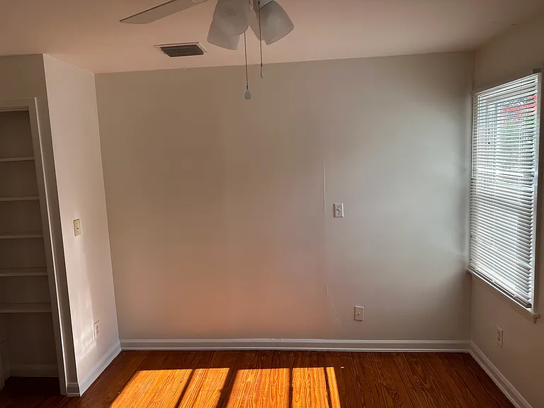 Front bedroom with built-in shelves