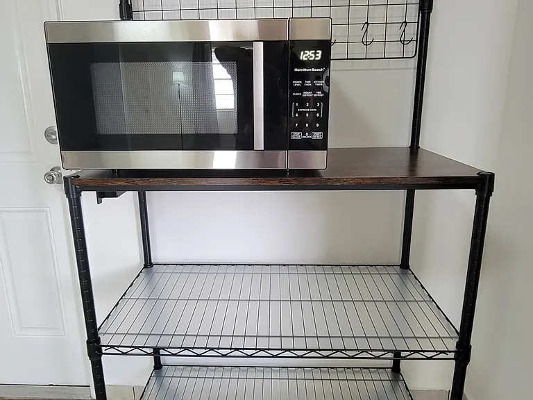 Bakers rack with microwave
