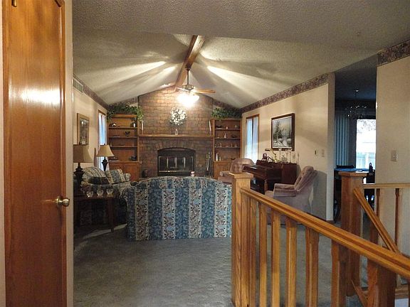 View from the front door into the house. Foyer has tile.