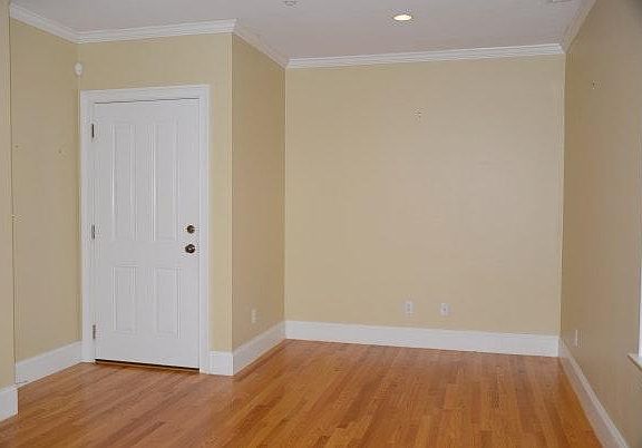 Open Plan Living Room/Kitchen with Gleaming Hardwood Floors