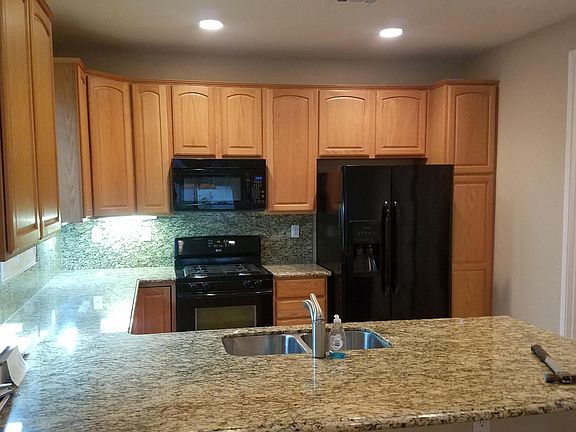 Kitchen with granite countertop