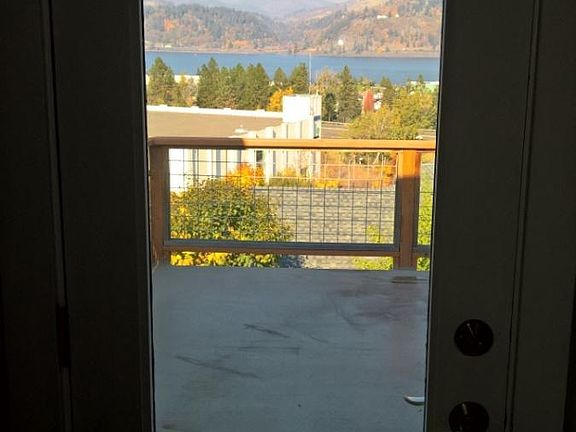 View out Bedroom #3 - door leads to deck with incredible riv