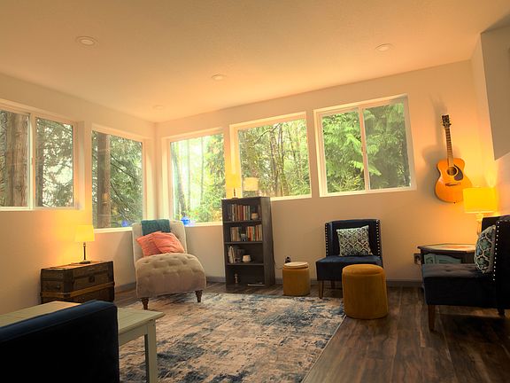 Spacious living room with cozy seating.