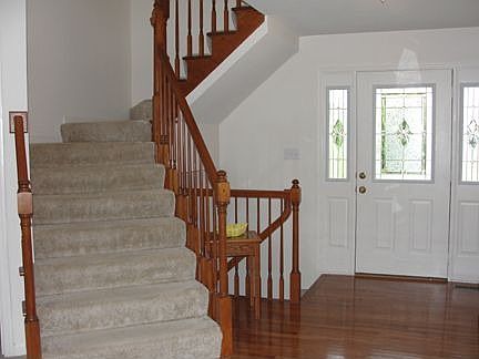 Stained staircase to 2nd level.