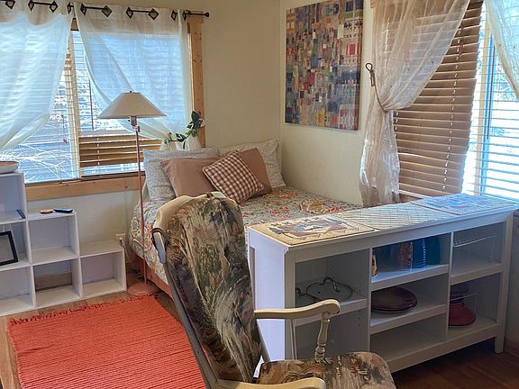 Comfortable rocking chair in front of TV
