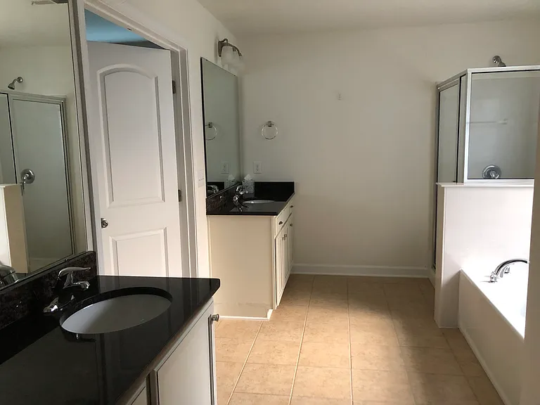 master bath with tile floor