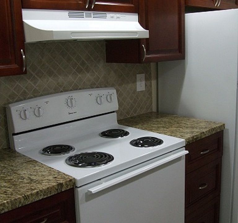 Granite and Wood Kitchen