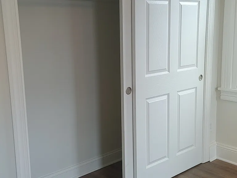 Double closet in bedroom