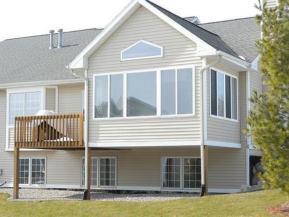 Rear View of Property and Deck