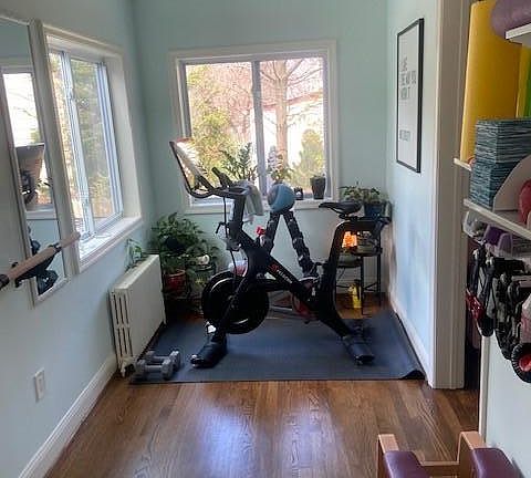 Sunroom on main level provides bonus space for office, workout, etc.