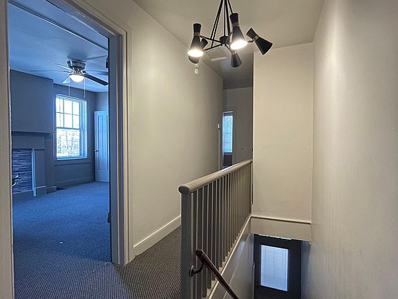 Top of staircase entry living room to left.