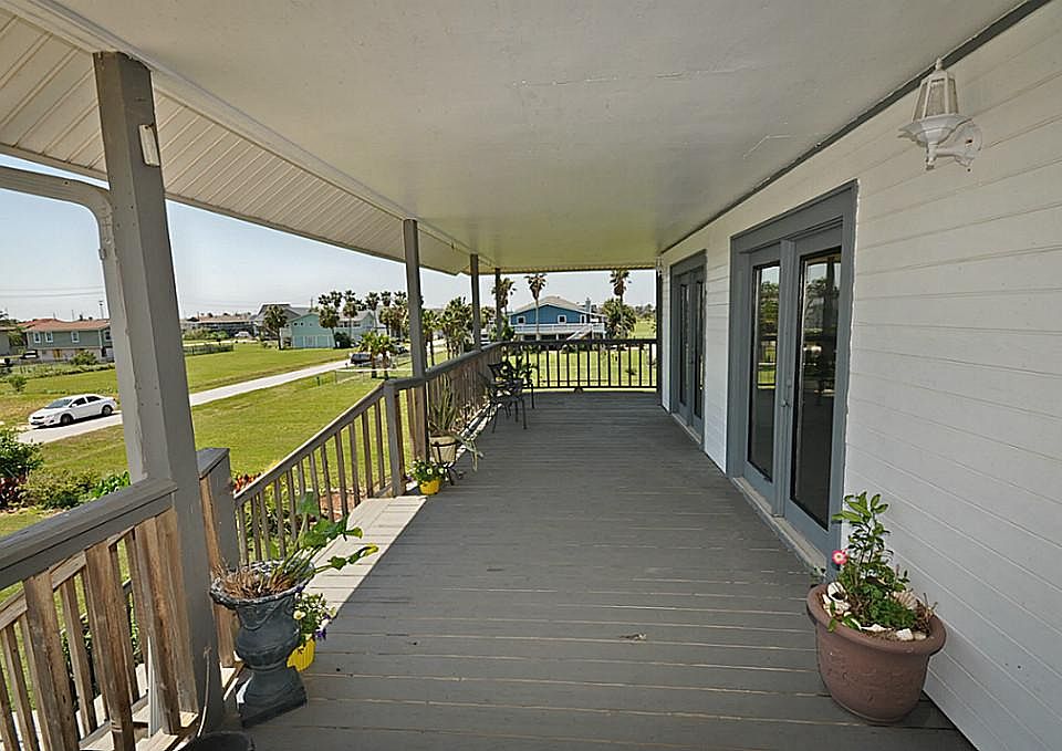Expansive covered front deck.