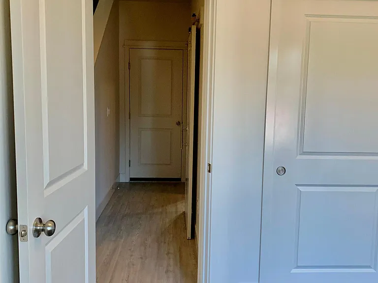 entry to garage and full bath with laundry room