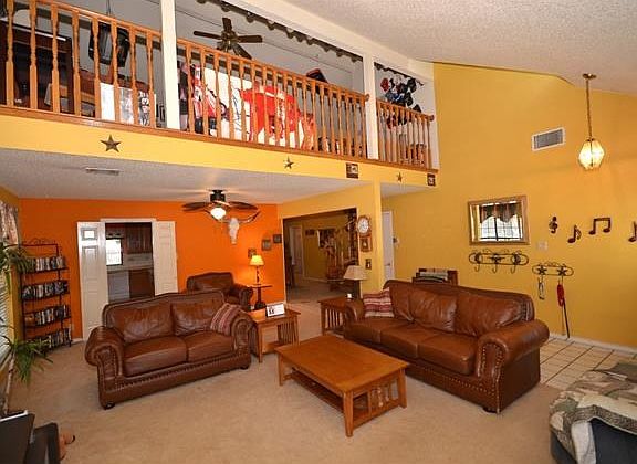Game room overlooking family room