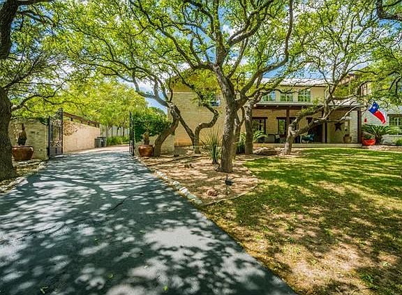Gated entry to the property completes the fenced back yard.