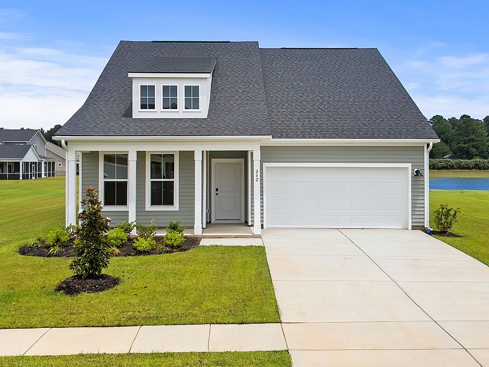 Chelsea Elevation 4 at Chestnut Farms in Longs, SC with front porch and upper-level window detail