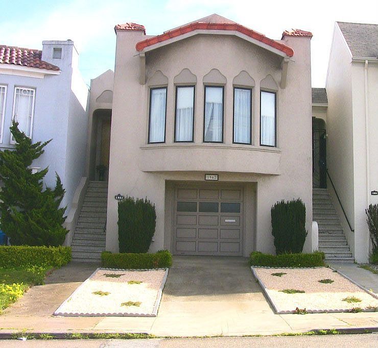 Home front driveway into garage