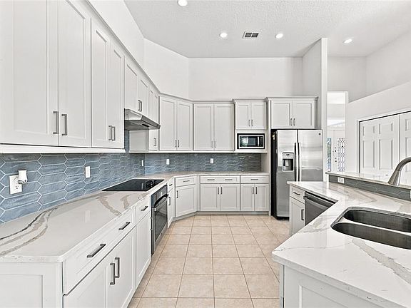 3rd image of 10008 CANOPY TREE COURT