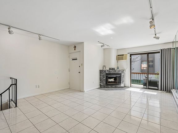 2nd image of 105 W Ridge Mews Wood #1E