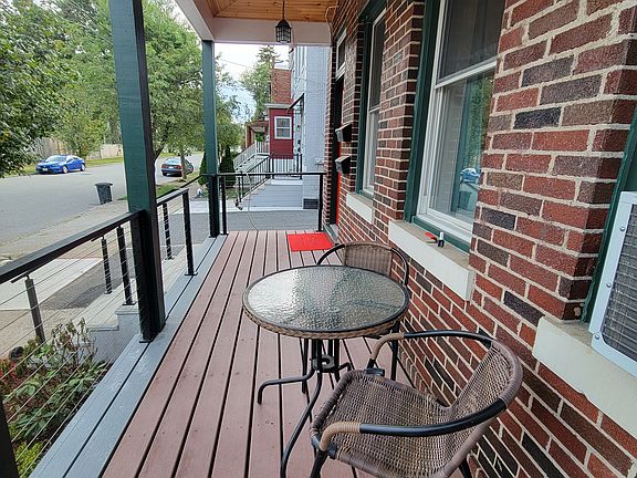 Use the front porch to work, eat, or relax.