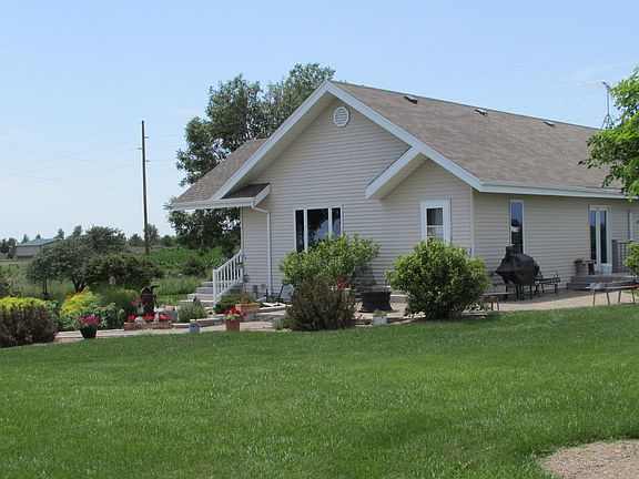 view of NE side & patio