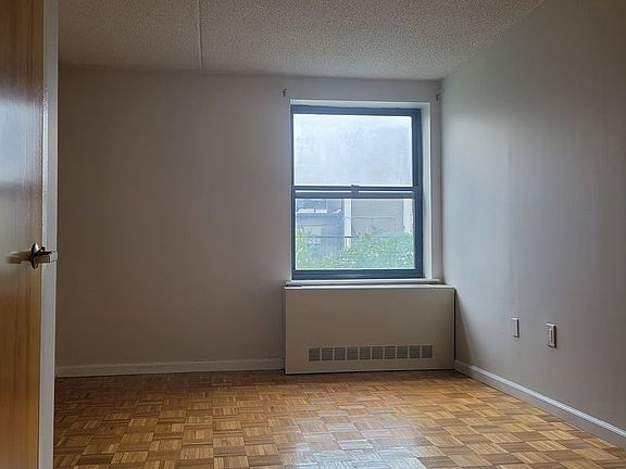 2nd image of 225 E 6th St APT 2L