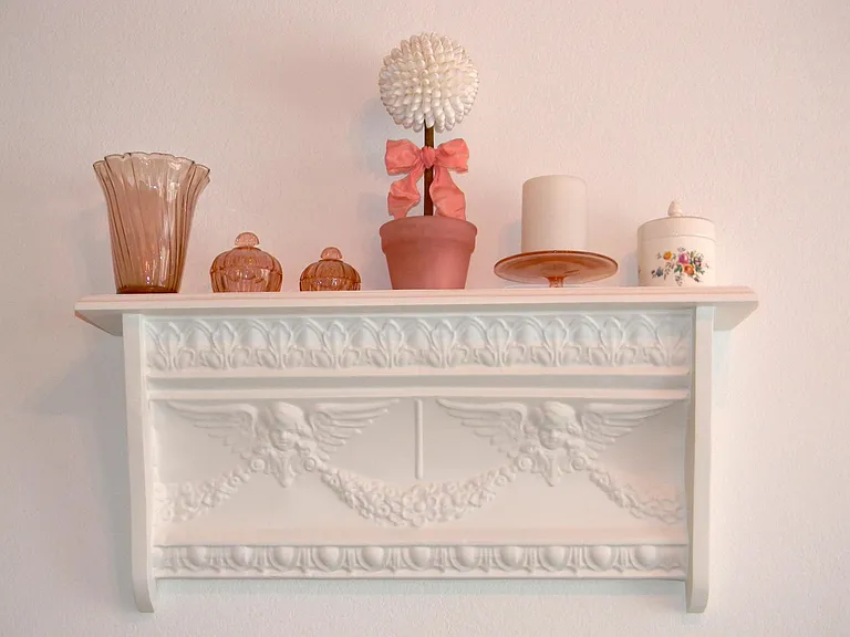 Hall BR Pretty in Pink 1930's Depression Glass crowning a vintage Pressed Tin Cherub Garland Wall Shelf