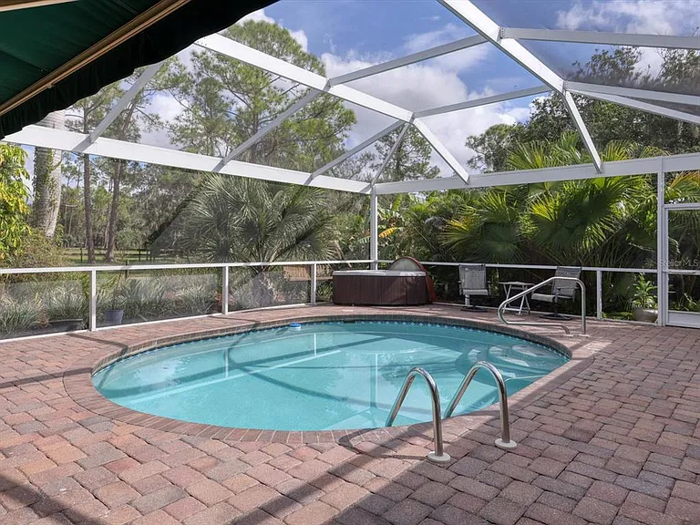 4708 Hidden River Rd — Photo 39
