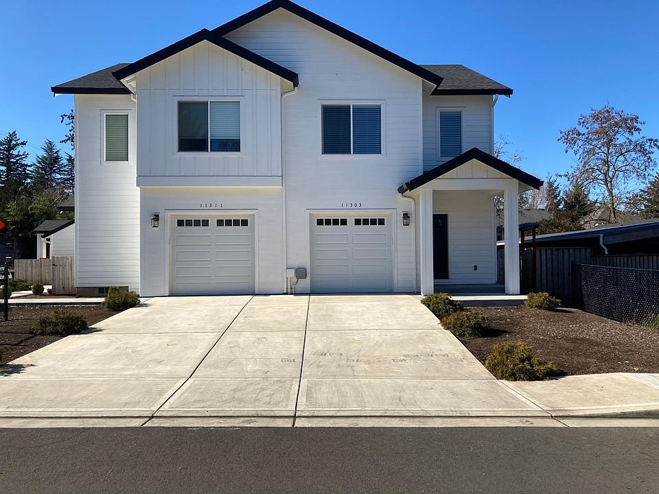Triplex with 11303 townhouse on the right.