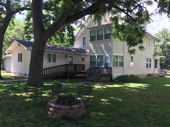 Shaded back yard w/fire pit