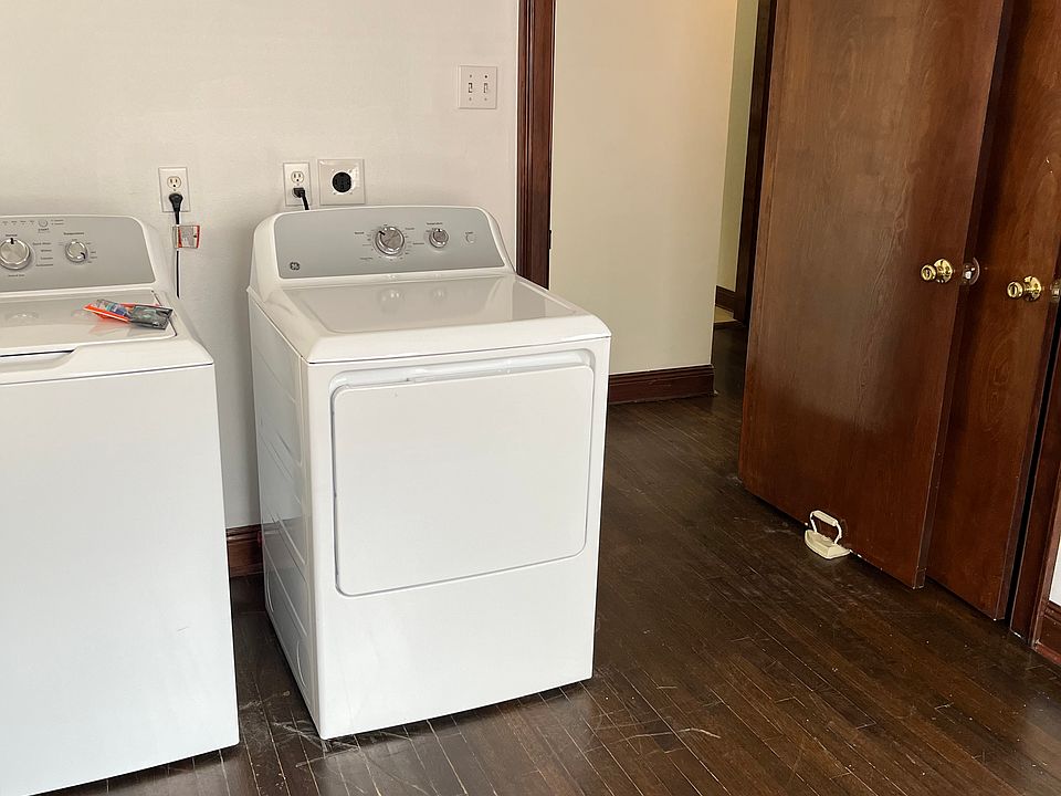 Large laundry room with new Washer/Dryer