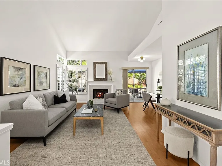 Bright and Spacious Living Room with High Ceiling (Furnishings Not Included)