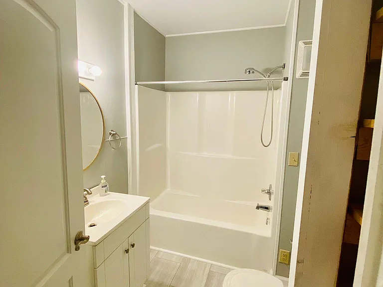 Bathroom: vanity and mirror