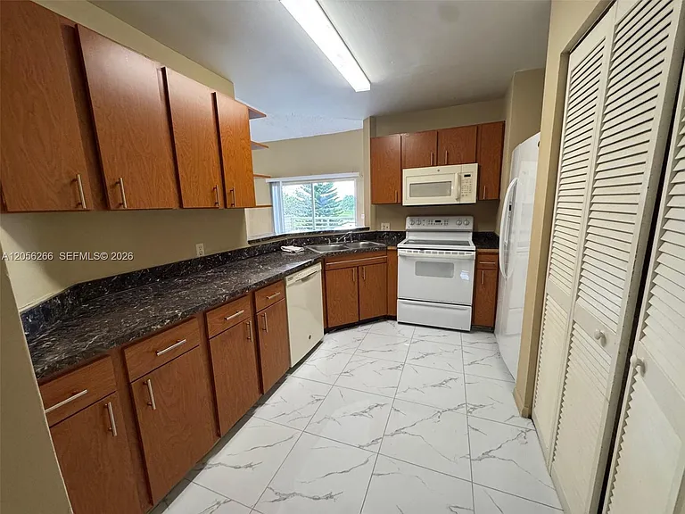 3441 NW 44th St #204 — Photo 7