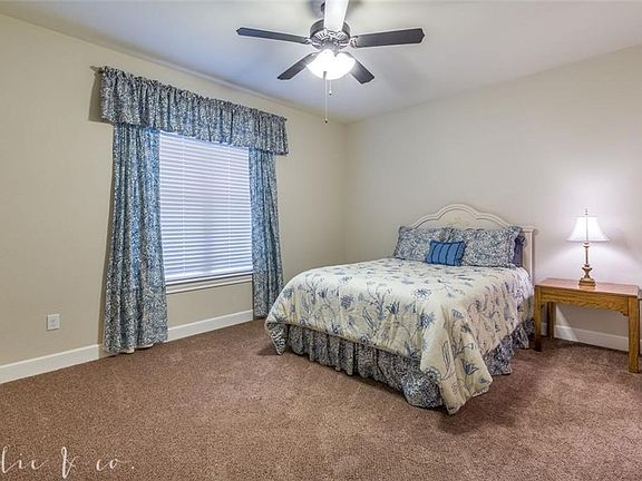 2nd master bedroom is located at the front of the house and is secluded from the living areas of the home.
