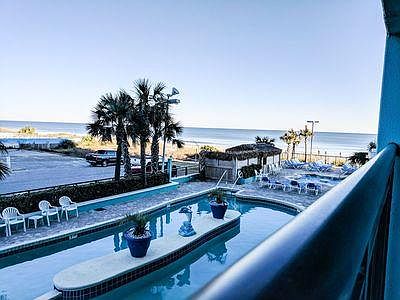 view from balcony, outdoor lazy river, huge hot tub the beac