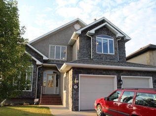 112 Strathlea Pl SW, Calgary, AB T3H4T6