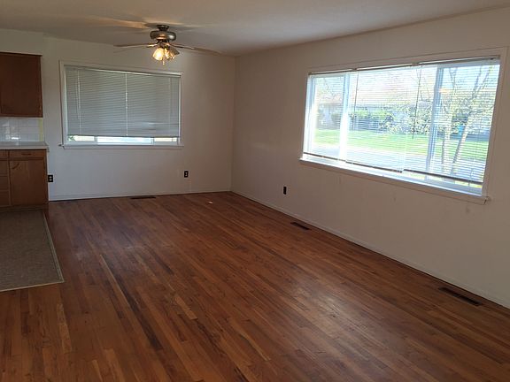 Large living room with lots of natural light