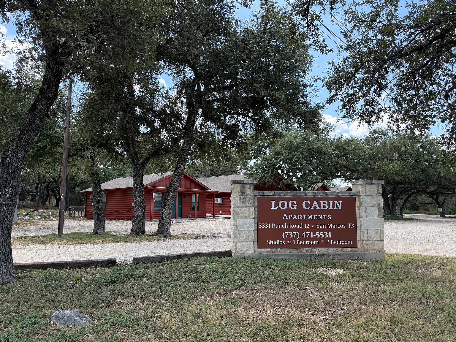 Log Cabin Plaza Apartments — Photo 1