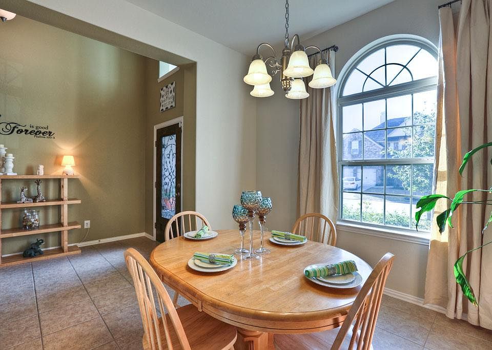 As you enter this light and bright home, a formal dining room is on the right.