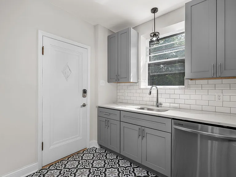 This door leads down to laundry & storage area.